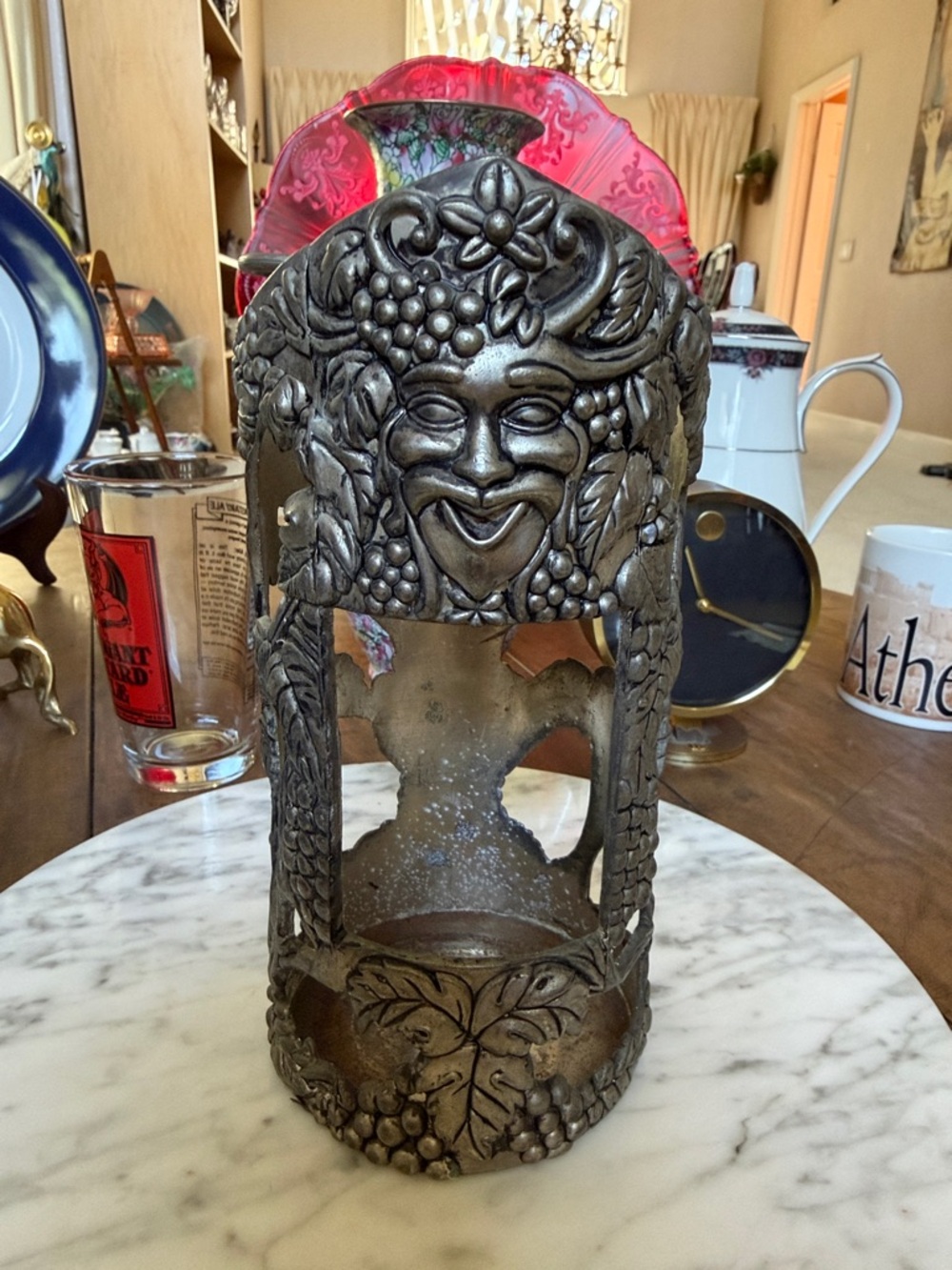 Vintage Decorative metal  Grapevine face bottle holder